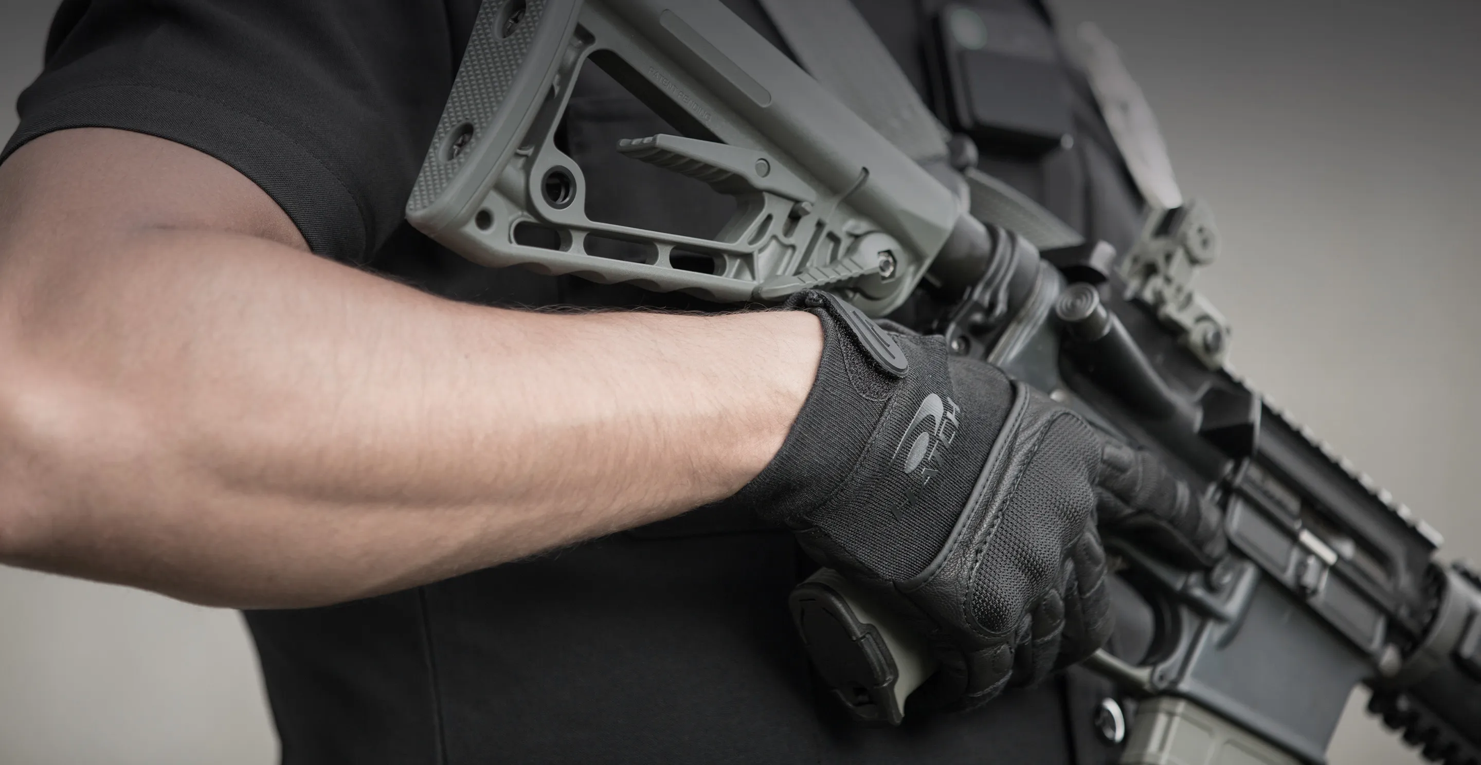 Firearms officer with hatch gloves on