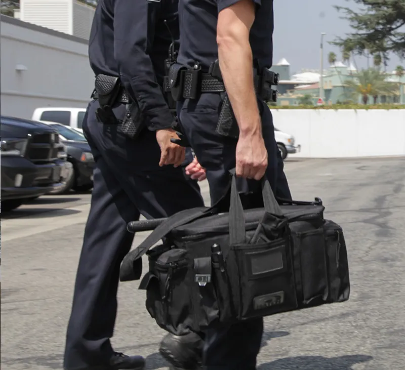 Police Carrying a hatch patrol Bag 